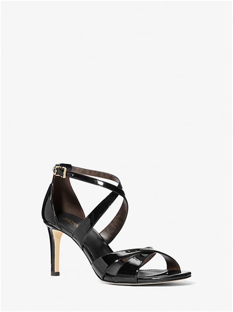 Kinsley Faux Patent Leather Sandal .